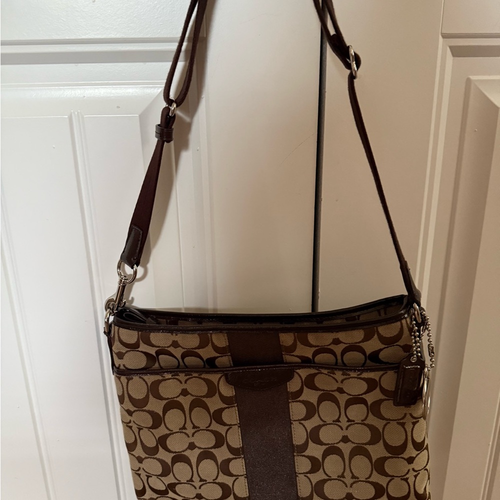 Coach Brown Monogram Crossbody Bag. Adjustable strap.  12” x 10”